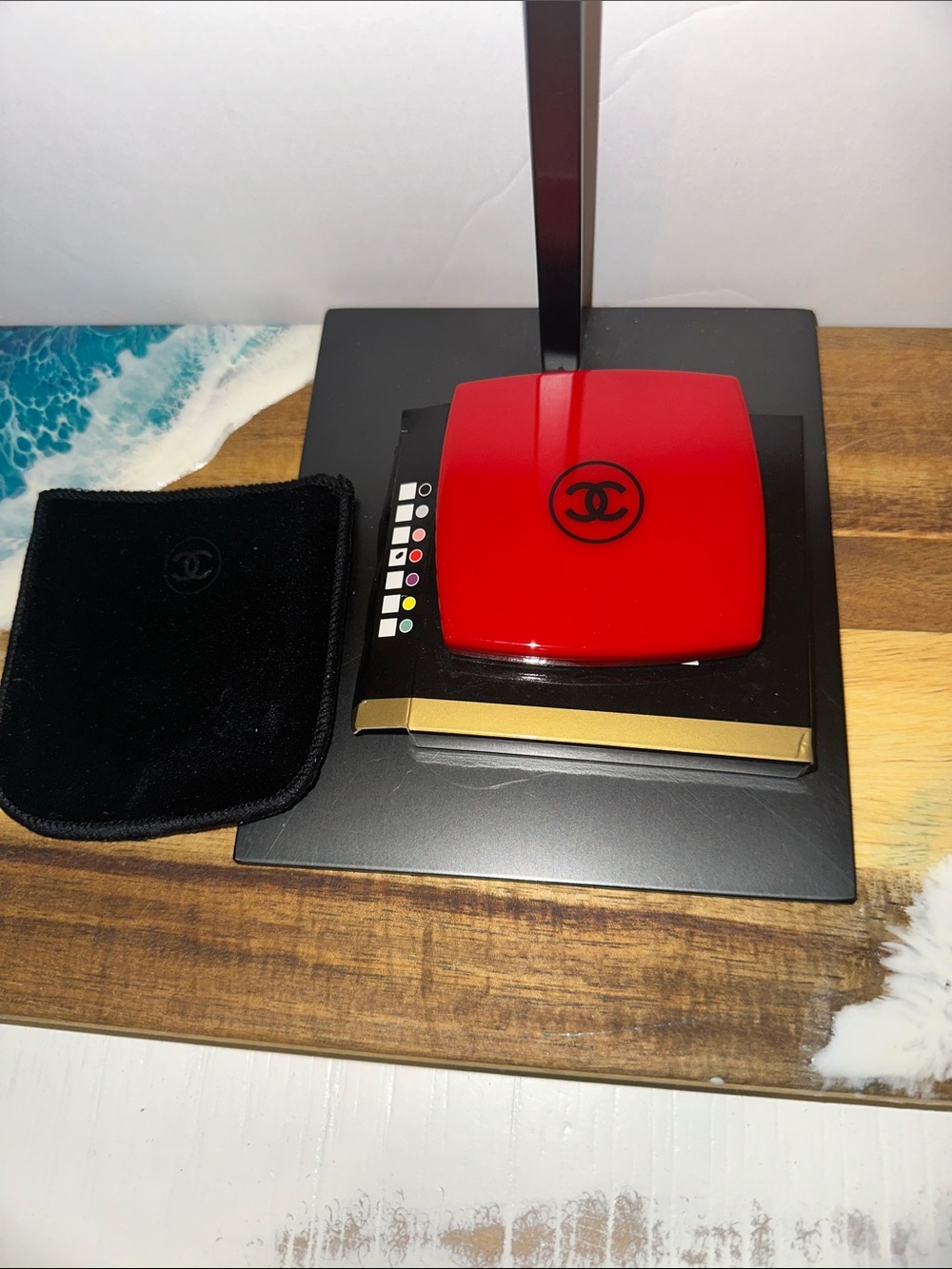 CHANEL Red Compact Mirror with Black Trim and Gold Accent